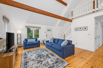 West Yarmouth Cape Cod vacation rental - Living room with exposed beams