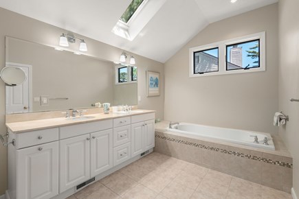 New Seabury, The Mews Cape Cod vacation rental - Large primary bathroom with soaking tub and shower