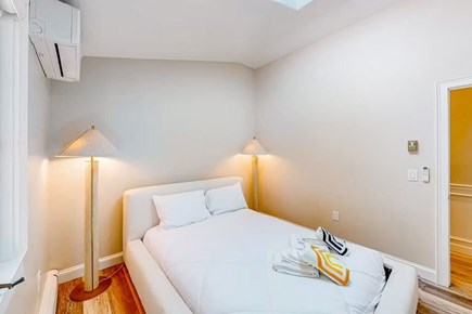 Bourne Cape Cod vacation rental - Queen bedroom with reading lamps and mini-split AC