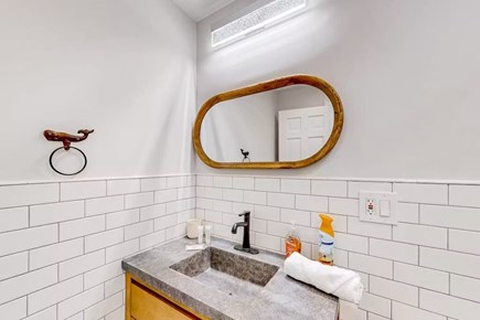 Bourne Cape Cod vacation rental - Bathroom detail with updated finishes and towel hooks