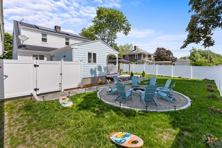 Hyannis Cape Cod vacation rental - Backyard fire pit area