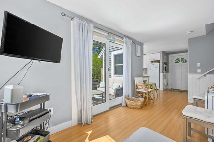 Chatham Cape Cod vacation rental - Living room TV for guest entertainment and relaxation.