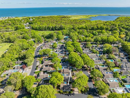 Mashpee Cape Cod vacation rental - An aerial view of the neighborhood shows a quiet residential setting surrounded by natural greenery