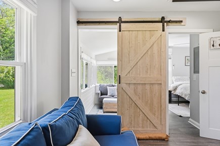 Brewster Cape Cod vacation rental - Barn door leading to the bedroom
