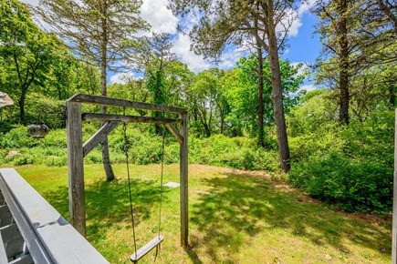 Brewster Cape Cod vacation rental - Swing in the backyard, offering a relaxing outdoor feature perfect for enjoying the fresh air