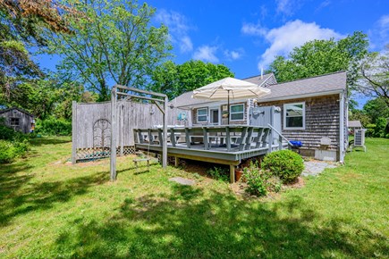 Brewster Cape Cod vacation rental - View of the deck, showcasing a welcoming outdoor space