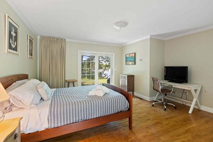 Cotuit Cape Cod vacation rental - Main level primary bedroom with queen bed