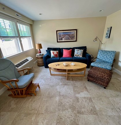 Dennisport Cape Cod vacation rental - Living room w queen sleep sofa, TV, games and puzzles