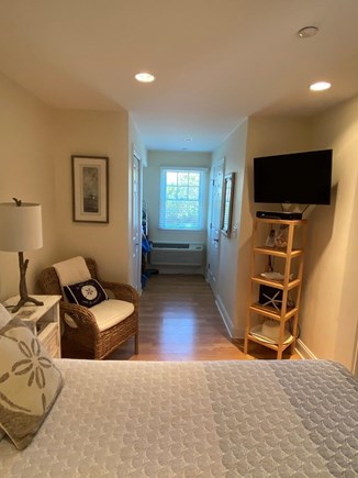 Dennisport Cape Cod vacation rental - Master bedroom w TV and adjoining full bath w walk in shower