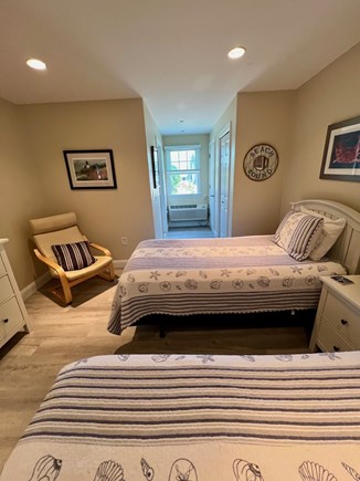 Dennisport Cape Cod vacation rental - 2 twin beds, closet, bureau, and adjoining full bathroom with tub