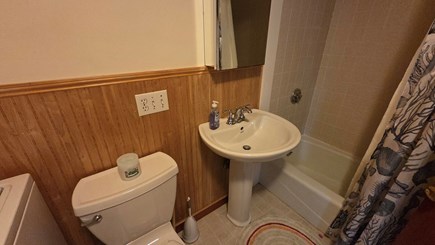 Orleans Cape Cod vacation rental - First floor bathroom with tub, washer and dryer