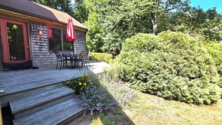 Orleans Cape Cod vacation rental - Side deck with table and chairs