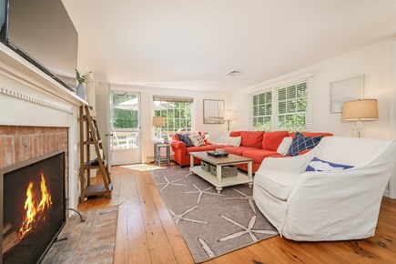 Chatham Cape Cod vacation rental - Living room with ample seating and deck entrance- 80 Lienau Dr Chatham Ma - Cape Cod- New England Vacation Rentals
