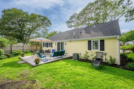 Hyannis Cape Cod vacation rental - View of the deck featuring comfortable outdoor seating, ideal for relaxing, entertaining, and enjoying the fresh air.