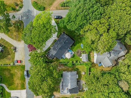Hyannis Cape Cod vacation rental - Overhead view of the property showcasing the full layout of the home, yard, and outdoor amenities from above.