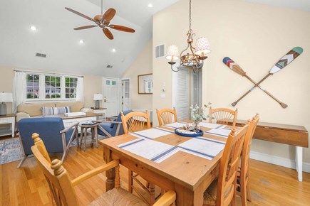 Hyannis Cape Cod vacation rental - Living room flows seamlessly into the dining area, creating an open and welcoming space