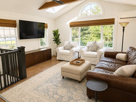 Harwich Cape Cod vacation rental - The first living room features a 65 inch Roku Smart TV