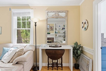 Centerville Cape Cod vacation rental - Living room includes a dedicated desk area, offering a convenient space for remote work or planning during your stay.