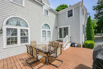 Centerville Cape Cod vacation rental - Deck with a dining table, offering an outdoor space for meals