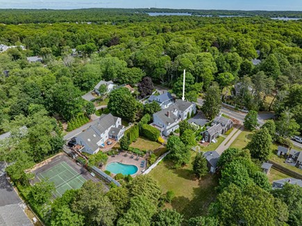 Centerville Cape Cod vacation rental - Aerial of property, shared pool, and tennis court