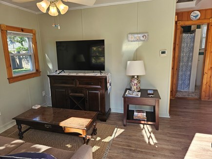 Dennisport Cape Cod vacation rental - View of entry way, with large tv and couch