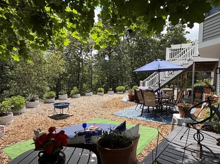 South Chatham Cape Cod vacation rental - Enjoy your back yard BBQ with multiple seating areas .