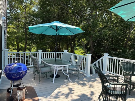 Dennis Cape Cod vacation rental - Wrap around deck with multiple seating areas
