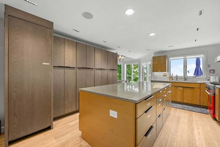 Plymouth MA vacation rental - Large kitchen island offering ample space for cooking, gathering, and entertaining, serving as the heart of the home