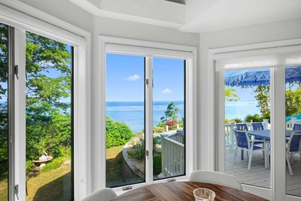 Plymouth MA vacation rental - Informal dining table just off the kitchen, featuring beautiful views of the ocean and backyard