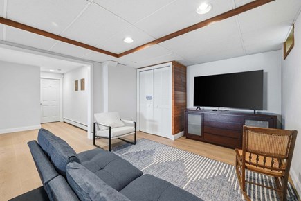Plymouth MA vacation rental - Lower-level living room offering a private retreat