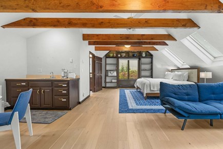 Plymouth MA vacation rental - Bedroom 4 is a studio-style suite featuring a combined sleeping and seating area,