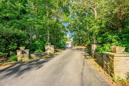 Plymouth MA vacation rental - View of the driveway from the road, showcasing easy access to the property