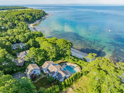 Plymouth MA vacation rental - Aerial view of the backyard and ocean showcasing the property’s stunning view
