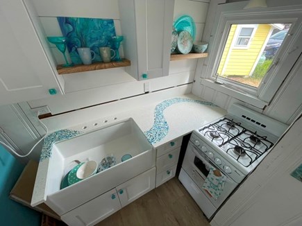 Dennisport, Chase Ocean Grove Cape Cod vacation rental - Recycled sea glass shaped into a wave countertops. A work of art.