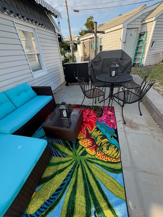 Dennisport, Chase Ocean Grove Cape Cod vacation rental - Covered patio with awning barbecue and prep counter.