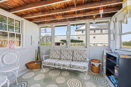 Sandwich Cape Cod vacation rental - Start your day on the cozy front porch with a cup of coffee.