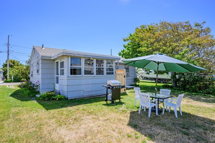 Sandwich Cape Cod vacation rental - Dine outdoors and grill your favorite meals in the private backyard.