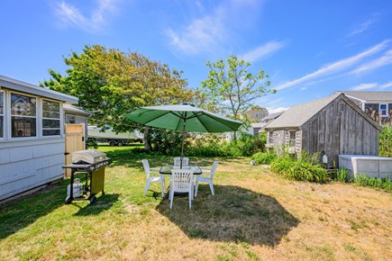 Sandwich Cape Cod vacation rental - Private backyard with dining, grilling area, and convenient outdoor shower.