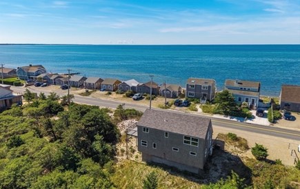 Truro - 9 min to Ptown Cape Cod vacation rental - An aerial view of the home before the remodel-to see the setting