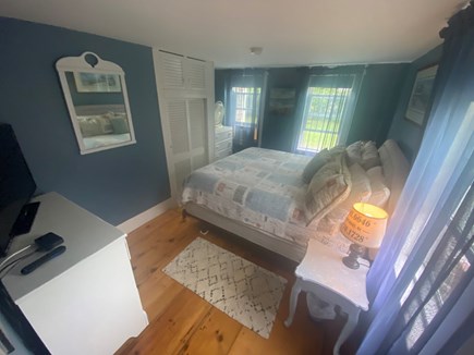 Dennisport Cape Cod vacation rental - 1st floor king bedroom with smart tv and window ac.