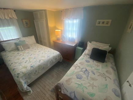 Dennisport Cape Cod vacation rental - 1st floor queen bedroom and a twin bed. Window ac.