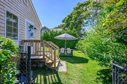 Bourne Cape Cod vacation rental - Side porch access to the backyard