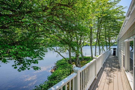 Centerville Cape Cod vacation rental - Wrap around deck leading to pond