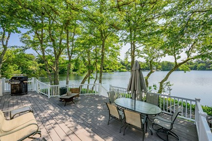 Centerville Cape Cod vacation rental - Outdoor dining area with grill and fire pit