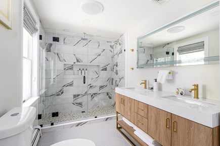 East Falmouth Cape Cod vacation rental - Primary suite step in shower, blue tooth speaker and dual sinks