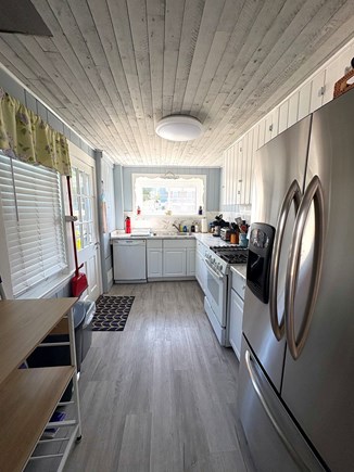 Dennis Port Cape Cod vacation rental - Full kitchen with fridge, gas stove, coffee machines, and more