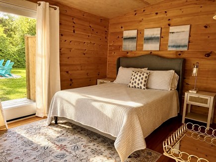 Falmouth Cape Cod vacation rental - Queen bed with slider to backyard and outdoor shower