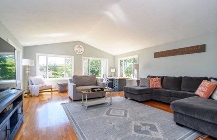 Mashnee Island, Bourne, Ma Cape Cod vacation rental - Living room with brand new split ac, smart tv and pullout chair