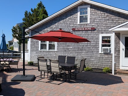 South Yarmouth Cape Cod vacation rental - The umbrella covers the table, can be rotated for best results