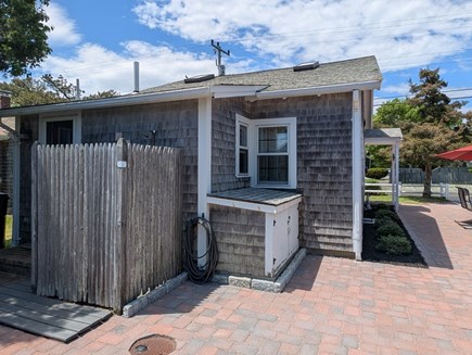 South Yarmouth Cape Cod vacation rental - Outdoor shower, hose, and cabinet for beach toys